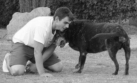 Man with Labrador in black and white